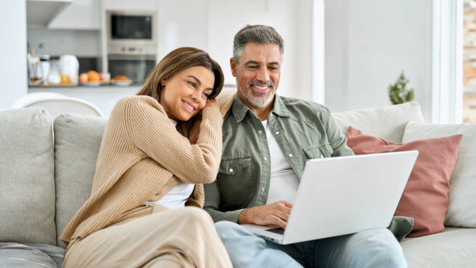 Couple looking at laptop